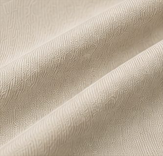 Camiseta Pima Signature na cor areia, detalhe do tecido