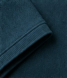 Polo Tricot Signature na cor azul petróleo, detalhe do punho