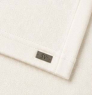Polo Tricot Signature na cor off-white, detalhe: outro